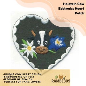 May include: Embroidered heart-shaped patch featuring a Holstein cow design with an edelweiss flower and a blue flower. The patch has a scalloped white border and includes the text "Holstein Cow Edelweiss Heart Patch".