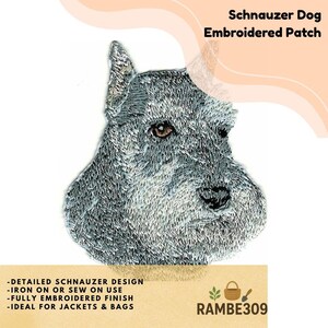May include: Embroidered patch featuring a detailed Schnauzer dog design. The patch is gray with brown eyes and a fully embroidered finish. Text on the patch reads "Schnauzer Dog Embroidered Patch". The patch is iron-on or sew-on and is ideal for jackets and bags.