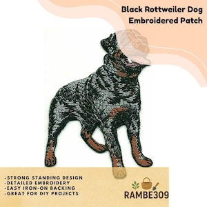 May include: Embroidered patch featuring a black Rottweiler dog in a standing pose. The patch has detailed embroidery and is designed for easy iron-on application. The text "Black Rottweiler Dog Embroidered Patch" is at the top.