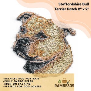 May include: Embroidered Staffordshire Bull Terrier patch, 2 x 2 inches, featuring a detailed dog portrait. The patch has iron-on backing. The text on the patch says "-DETAILED DOG PORTRAIT -FULLY EMBROIDERED -IRON-ON BACKING -PERFECT FOR DOG LOVERS" and "RAMBE309".
