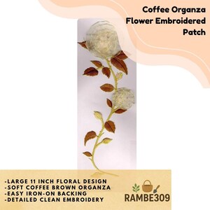 May include: Coffee organza flower embroidered patch with a 11-inch floral design. The patch features soft coffee brown organza and detailed clean embroidery. The patch is easy iron-on backing. The text "Coffee Organza Flower Embroidered Patch" is at the top.