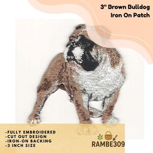 May include: A fully embroidered 3-inch brown bulldog iron-on patch. The patch features a detailed design of a bulldog with brown, black, and white coloring. The patch has an iron-on backing and a cut-out design.