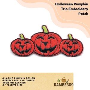 May include: A Halloween-themed embroidery patch featuring three smiling pumpkins in shades of red, with black facial features and green stems. The patch has an iron-on backing and is approximately 2 inches in size. The text "Halloween Pumpkin Trio Embroidery Patch" is at the top.
