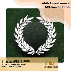 May include: White laurel wreath iron-on patch. The patch features a fully embroidered design with clean white thread. The text "White Laurel Wreath SCA Iron On Patch" is at the top. The patch is easy to iron on and is ideal for SCA garb.