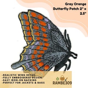 May include: Gray and orange butterfly patch, 2 inches by 2.5 inches, with realistic wing detail and easy iron-on backing. The patch features a fully embroidered design. The text on the patch says "Gray Orange Butterfly Patch 2" x 2.5" and "RAMBE309".
