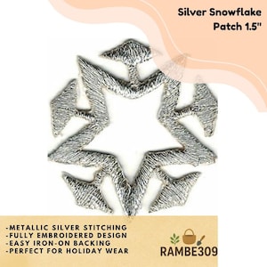 May include: A silver snowflake patch, 1.5 inches in diameter, with metallic silver stitching and a fully embroidered design. The patch has an easy iron-on backing. The text "Silver Snowflake Patch 1.5" is displayed at the top.