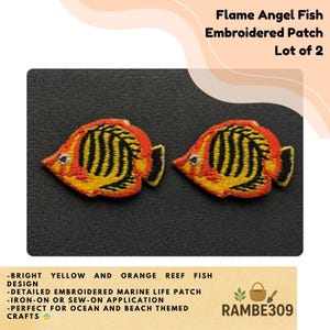May include: Two embroidered patches shaped like Flame Angel fish. Each patch features a bright orange and yellow body with vertical black stripes, a small white eye, and a black tail fin. The design is detailed with dense thread work.