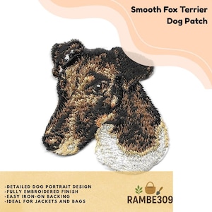 May include: Embroidered Smooth Fox Terrier dog patch. The patch features a detailed portrait of the dog's head in brown, black, and white thread. The text "Smooth Fox Terrier Dog Patch" is at the top. The patch has an easy iron-on backing.