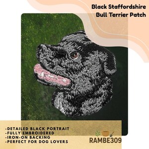 May include: Black Staffordshire Bull Terrier patch with a detailed black embroidered portrait of a dog. The patch has iron-on backing. The text "Black Staffordshire Bull Terrier Patch" is at the top.