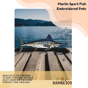 May include: Embroidered patch featuring a marlin sport fish design. The patch has clean stitched details and is easy to iron on. The patch is set against a backdrop of a lake and wooden dock. The text "Marlin Sport Fish Embroidered Patc" is at the top.
