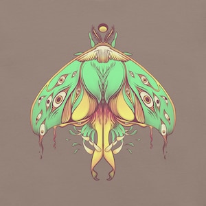 May include: A green and yellow moth with intricate details and large eyes. The moth has a symmetrical design and is depicted against a light brown background.