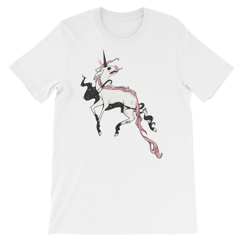 May include: White t-shirt with a black and pink illustration of a unicorn with a starry body and a long pink mane.