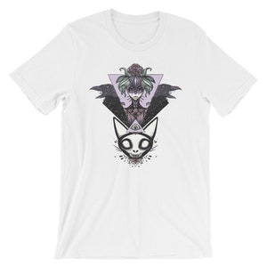 May include: White t-shirt with a black and white illustration of a woman with a floral crown, two ravens, and a cat with an all-seeing eye. The illustration is surrounded by a triangle.