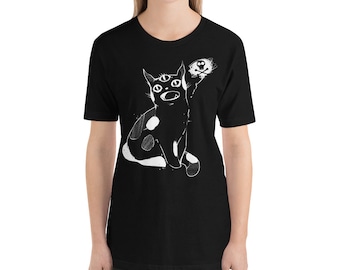 May include: Black t-shirt with a white graphic of a three-eyed cat with a skull and crossbones in the background.