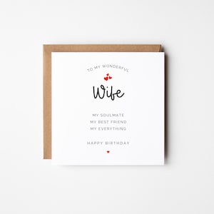 May include: A white card with a brown envelope, featuring the text "TO MY WONDERFUL Wife" with red heart details. The card also includes the phrases "MY SOULMATE, MY BEST FRIEND, MY EVERYTHING, HAPPY BIRTHDAY."