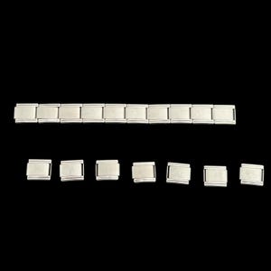 May include: Silver-toned rectangular charm bracelet links and individual charms against a black background. The bracelet is composed of multiple rectangular links. Several individual charms are also displayed.