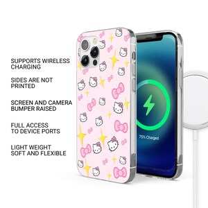 May include: A pink phone case featuring a repeating pattern of Hello Kitty faces, bows, and yellow starbursts. The phone case is shown next to a phone with a charging screen. Text on the case reads: Supports Wireless Charging, Sides are Not Printed.
