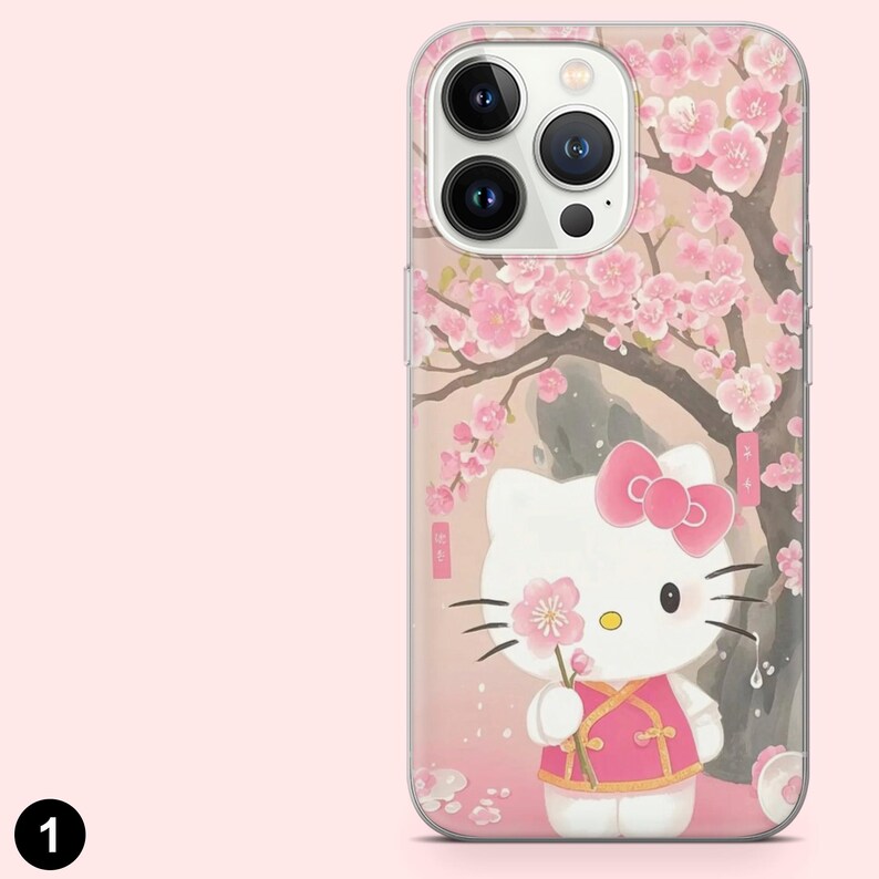 May include: A clear phone case with a Hello Kitty design. The case features Hello Kitty in a pink outfit, holding a flower, set against a cherry blossom tree. The design uses a soft, pastel colour palette.