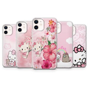 May include: Five pink phone cases with various designs. One case features Hello Kitty with a teddy bear, another has Hello Kitty with flowers, and a third showcases vibrant pink hibiscus flowers. The remaining cases display Hello Kitty with a rainbow and clouds.