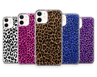 May include: A collection of five phone cases with leopard print designs. The cases feature a variety of colors, including black and white, hot pink, brown, blue, and purple. The cases are designed to fit a smartphone.