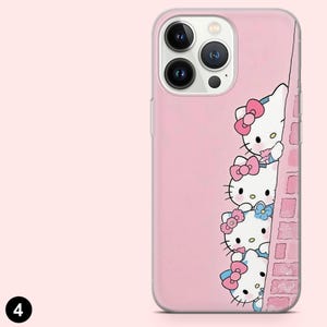 May include: Pink phone case featuring a design of Hello Kitty characters peeking from behind a brick wall. The case has a clear border and a pink background. The Hello Kitty characters have pink and blue bows.
