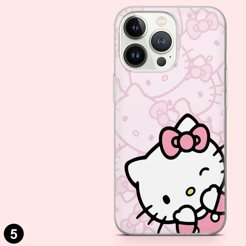 May include: A pink phone case featuring a repeating pattern of bows and a smiling cartoon cat with a pink bow. The case has a clear border and a camera cutout.