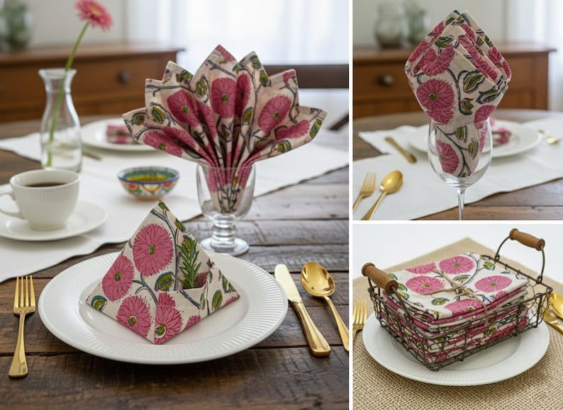 May include: Cloth napkins with a pink floral pattern on a cream background are displayed in different ways. Gold cutlery and white plates are set on a wooden table, creating a dining scene. Napkins are folded in various styles.