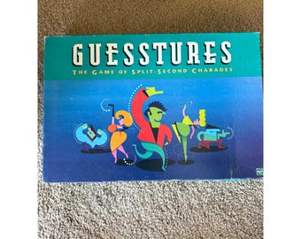 Hasbro Guesstures O Jogo de Charadas em Frações de Segundo, Jogo de Tabuleiro Clássico de 1998