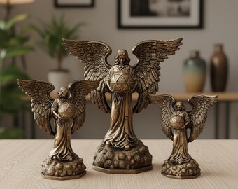 May include: Three bronze angel figurines with detailed wings and flowing robes. Each angel holds a geometric sphere. The statues vary in size and are displayed on a light-colored wooden surface, creating a decorative display.