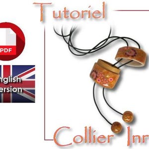 Op de afbeelding: Afbeelding van een tutorial voor een Inrô-ketting. De ketting bestaat uit twee decoratieve, cilindrische kralen met bloemmotieven, verbonden door zwarte koorden. De tekst "Tutoriel" en "Collier Inrô" is aanwezig, evenals een PDF-pictogram en een vlag "English Version".