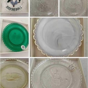 May include: Collection of decorative glass plates in various designs. One plate features the word "BAYBERRY" with a berry and leaf design. Other plates have embossed images and scalloped edges. Some plates are green.