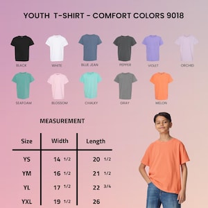 May include: A Comfort Colors 9018 youth t-shirt color chart displaying eleven solid color options including black, white, blue jean, pepper, violet, orchid, seafoam, blossom, chalky, gray, and melon, with a size chart in inches for YS to YXL.