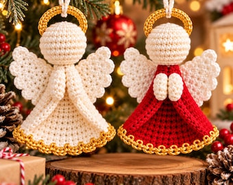May include: Two handmade crochet angel ornaments hanging by white strings. One angel is solid cream with a gold halo and hem, while the other features a cream head and wings with a deep red dress, gold halo, and gold hem. Both have folded hands.
