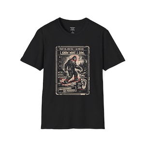 Puede incluir: Camiseta negra con un gráfico de Bigfoot y el texto "I KNOW WHAT I SAW." El diseño incluye una tabla de altura, una huella y las palabras "UNCONFIRMED BUT PERSONAL."
