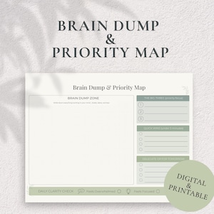 May include: A set of three ceramic mugs with a speckled, matte finish. The mugs are in shades of cream, light gray, and dark gray. Each mug has a simple, minimalist design, perfect for coffee or tea.