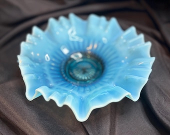 Vintage Fenton blue opalescent glass bowl.