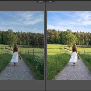May include: A long white skirt worn by a person with long brown hair walking away on a gravel path through a green meadow. The scene features a line of wooden fence posts, lush green grass, and a dense forest under a clear blue sky.
