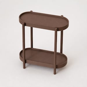 May include: A brown two-tiered side table with an oval-shaped top and bottom shelf. The structure features four vertical cylindrical legs that extend slightly above the top surface, supporting the two smooth, flat, oval trays in a stacked design.