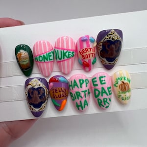Uñas postizas con motivos de dulces y golosinas mágicas (SE REQUIEREN MEDIDAS)