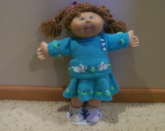 A Three Piece Outfit of a Crew Neck Sweater Swing Skirt and Bloomers for CPK's Embroidered Rabbit and Flowers Three Rabbit Buttons
