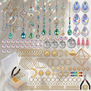 May include: A suncatcher making kit featuring various gold-toned metal geometric frames, chains, jump rings, and assorted crystal prisms in teardrop, sphere, and faceted shapes. Includes two pairs of pliers and a clear plastic storage container.