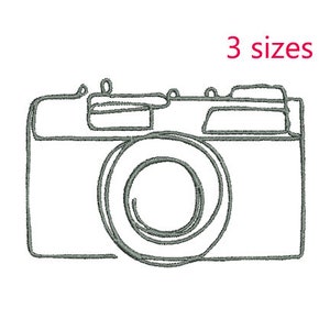 May include: A line drawing of a camera in black and white. The camera has a lens, a viewfinder, and a body. The drawing is simple and minimalist.