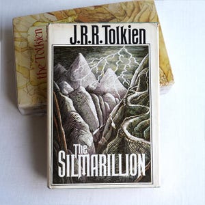 First Edition 12th Printing &quot;The Silmarillion&quot; by J.R.R. Tolkien with Pull-Out Map - Dust jacket Hardcover Book