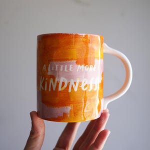 CHOICE: Anthropologie Mug Orange Kindness