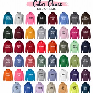 May include: A Gildan 18500 color chart displaying a grid of hooded sweatshirts in various solid colors and heathered tones. Each hoodie is labeled with its specific color name, including options like antique sapphire, ash, azalea, black, cardinal red, and others.