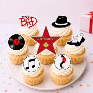 May include: A set of seven cupcake toppers featuring a red star with the text Happy Birthday, a black fedora, a black vinyl record, a musical note, a silhouette of a dancer in a red jacket, and the text Who's Bad in red, all on white frosting.