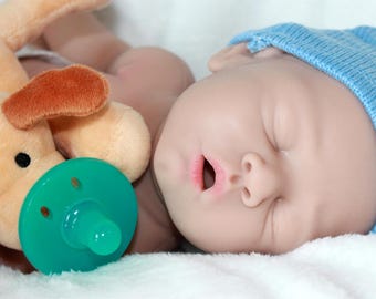 Lebensechte 17 "Silikon Reborn Babypuppe: Gewichtet, Nimmt Schnuller."
