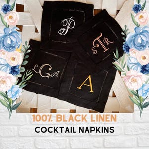 May include: Four black linen cocktail napkins with embroidered initials. The initials are "P", "STR", "LGA", and "A".