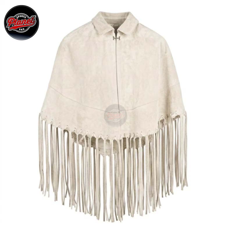 Women's genuine suede leather fringe western boho cape poncho — A cream-colored suede poncho featuring a classic collar, a single silver-toned metal hook-and-eye closure at the neckline, and a horizontal seam across the chest. The hem is adorned with