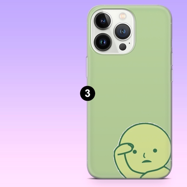 Puede incluir: Funda de tel&eacute;fono verde claro con una ilustraci&oacute;n de dibujos animados de una persona pensando. La funda tiene un acabado liso y un recorte para la c&aacute;mara. El n&uacute;mero 3 est&aacute; impreso en el lateral de la funda.